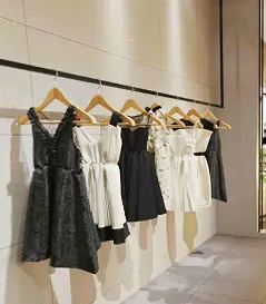 Virtual showroom displaying fashion apparel in an immersive 3D environment for online shoppers